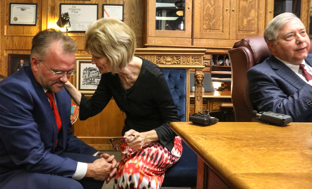 Connie Elison, the mother and heir of Thomas Ray Stanfield, who was shot to death on June 20, 2018, consoles her son, Grant Stanfield, after talking with the media about what happened in the shooting, following a press conference in attorney Robert Sykes' office in Salt Lake City on Tuesday, June 26, 2018. Photo: Steve Griffin, KSL
