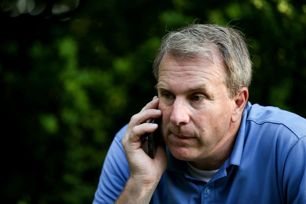 Chris Herrod, Republican primary candidate for Utah's 3rd Congressional District, takes a phone call at his home in Provo on primary election night, Tuesday, June 26, 2018. (Photo: Spenser Heaps, KSL)