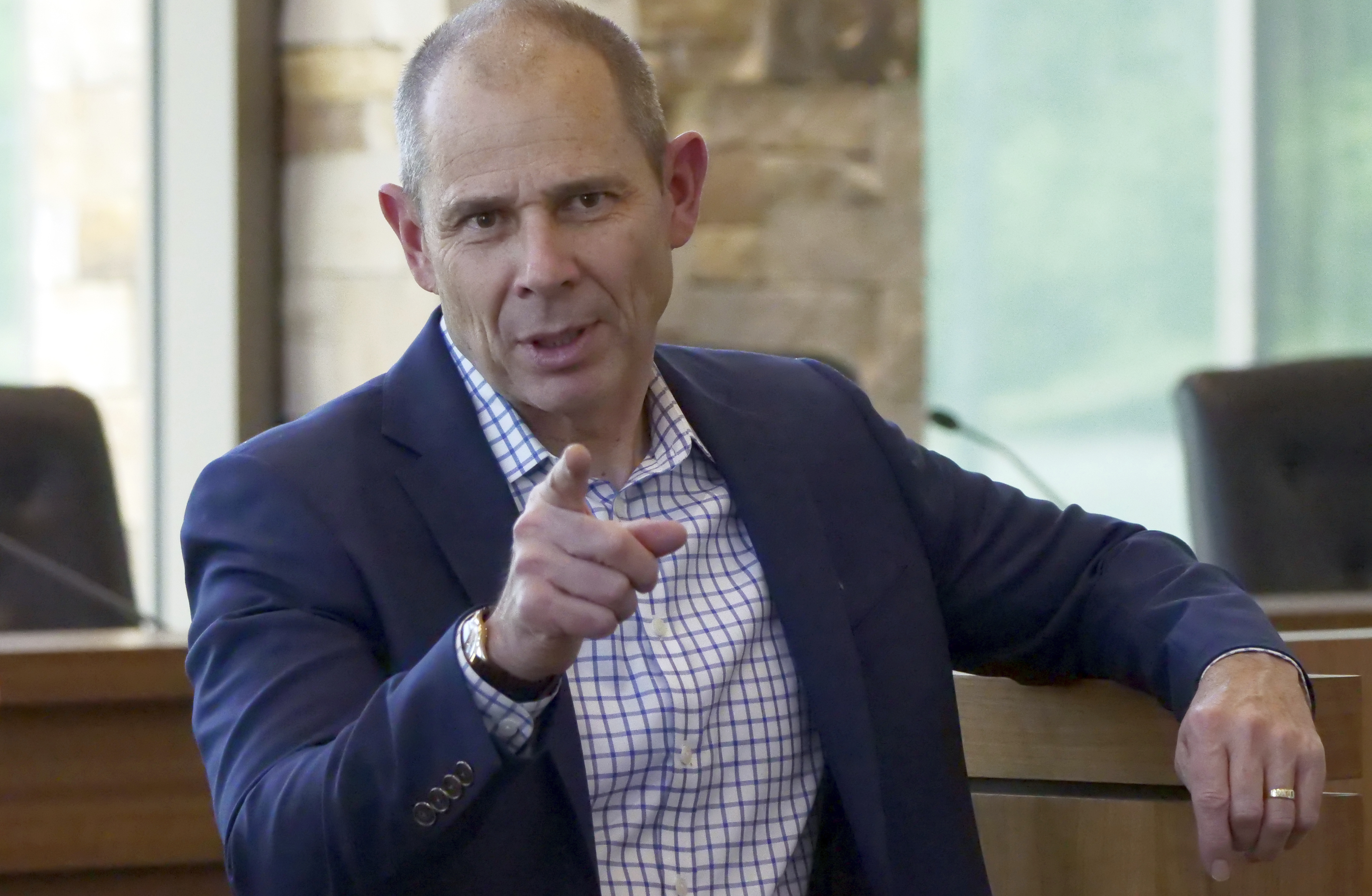 In this Saturday, June 23, 2018, photo, U.S. Rep. John Curtis speaks during a town hall meeting, in Cottonwood Heights, Utah. Curtis is looking to take a major step toward winning his first full term in Congress in Utah's 3rd District. He won a special election to finish Rep. Jason Chaffetz's term months ago, and is now facing a rematch against former state lawmaker Chris Herrod. (AP Photo/Rick Bowmer)