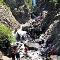 Looking for a short waterfall hike? Donut Falls has you covered