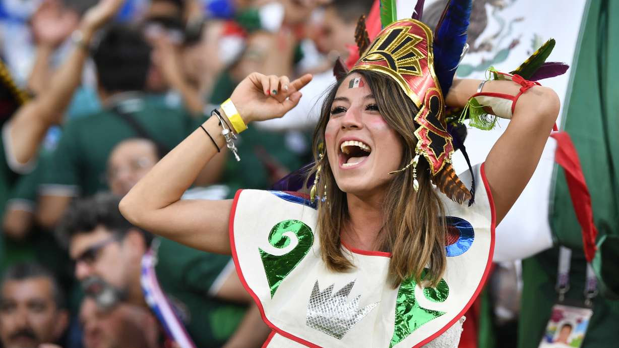 Mexican fans celebrate South Korea's victory over Germany
