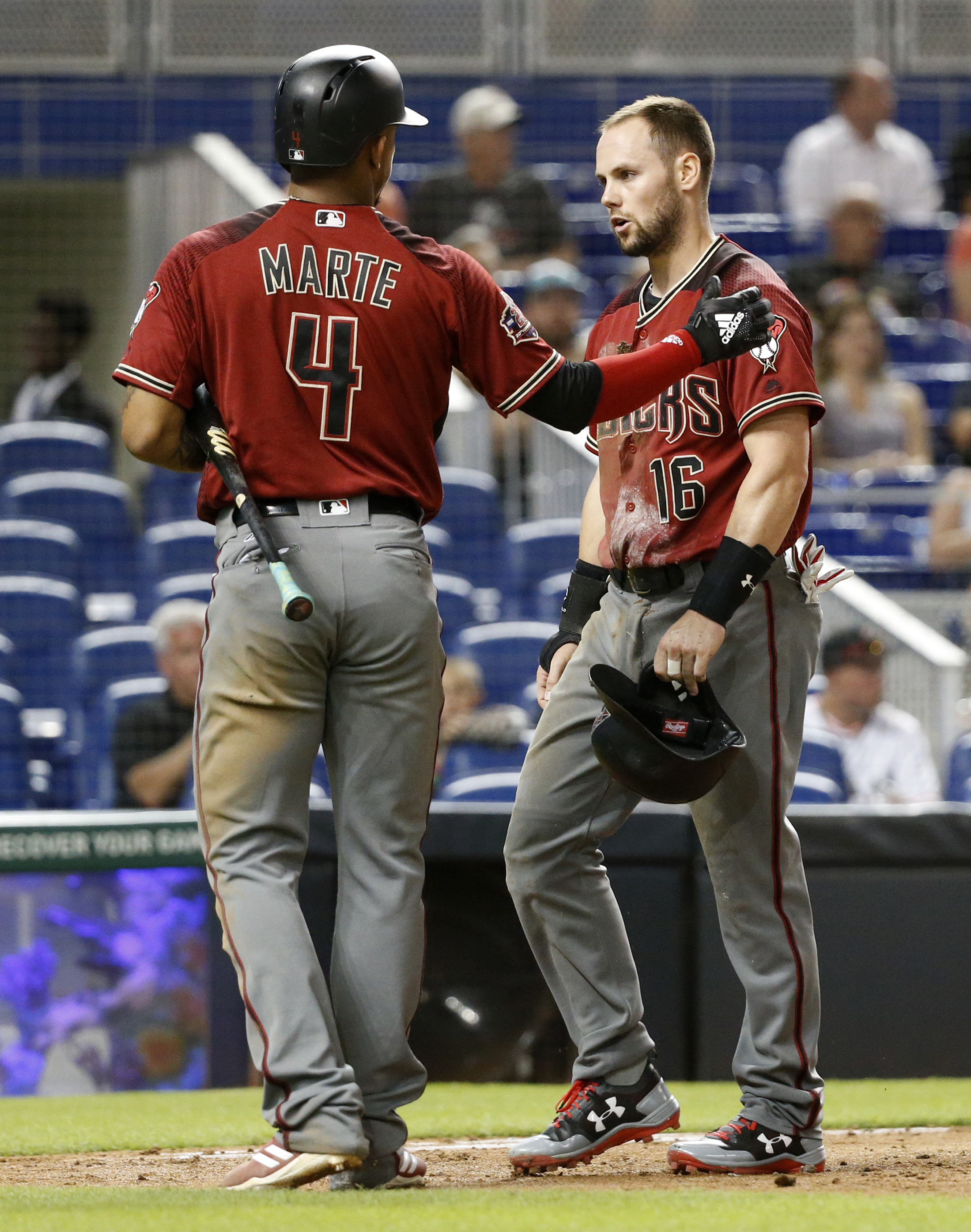Ray sharp in return as Diamondbacks beat Marlins 2-1
