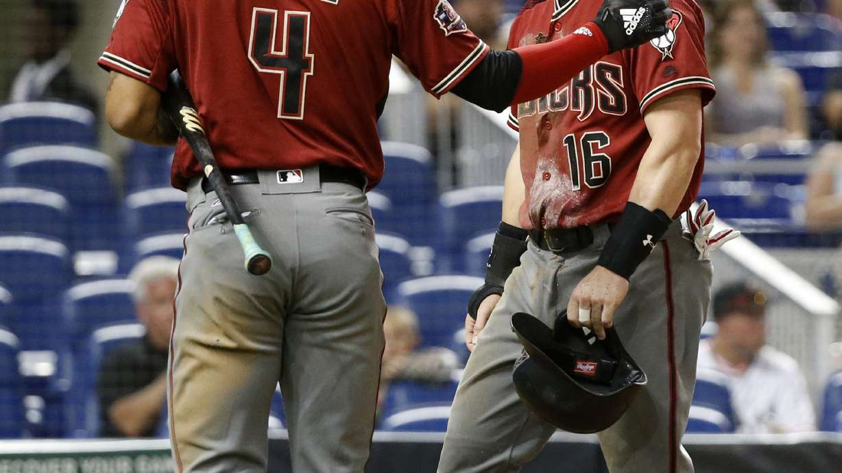 Ray sharp in return as Diamondbacks beat Marlins 2-1