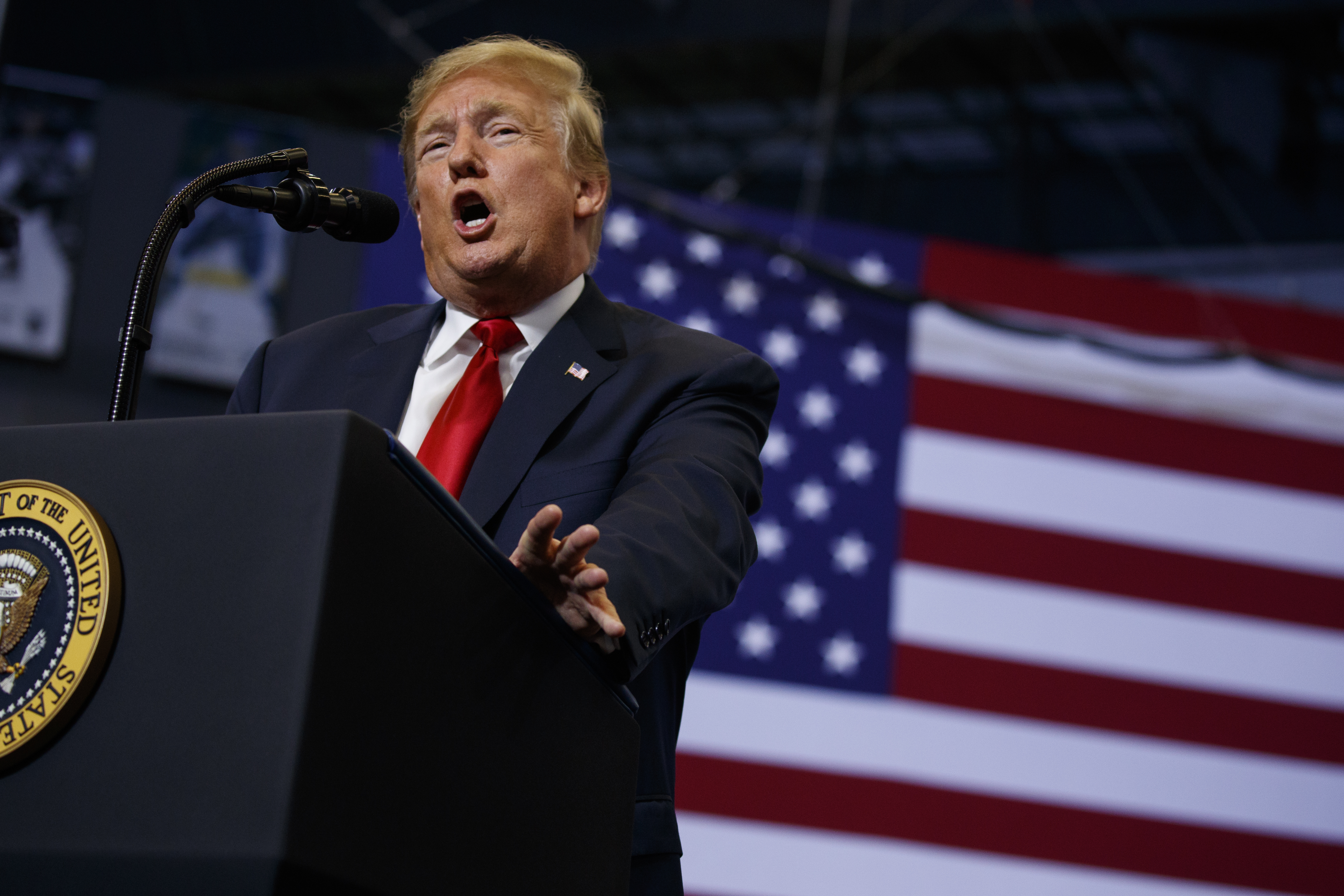 Amid Harley feud, Trump hails economy at future factory site