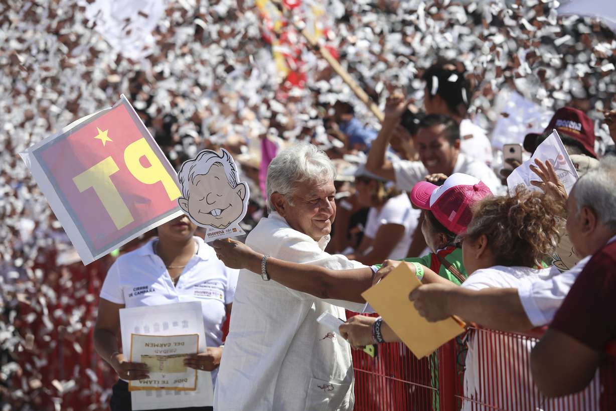 Mexico's presidential candidate Andres Manuel Lopez Obrador of the MORENA party arrives to a campaign rally in Veracruz, Mexico, Saturday, June 23, 2018. Lopez Obrador has led opinion polls since the beginning of the campaign, and some recent surveys give him a 2-1 advantage over his nearest rival. (AP Photo/Felix Marquez)