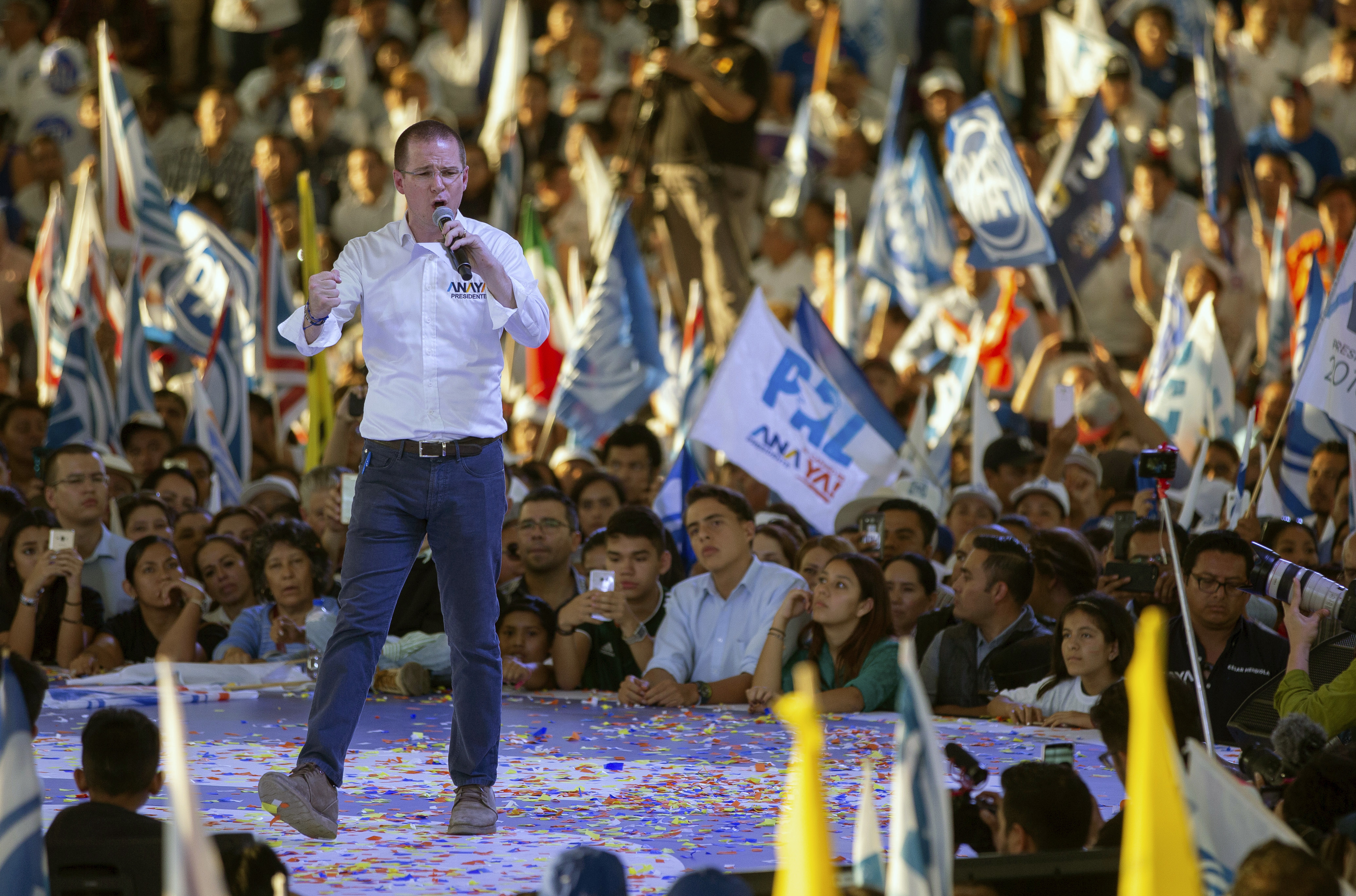 Presidential candidate Ricardo Anaya, of the left-right Forward for Mexico Coalition, holds his closing campaign rally in Leon, Mexico, Wednesday, June 27, 2018. (AP Photo/Anthony Vazquez)