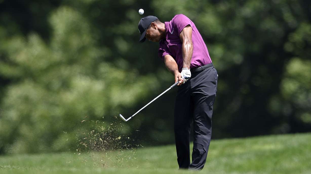 Hossler has early lead, Woods within 4 shots at TPC Potomac