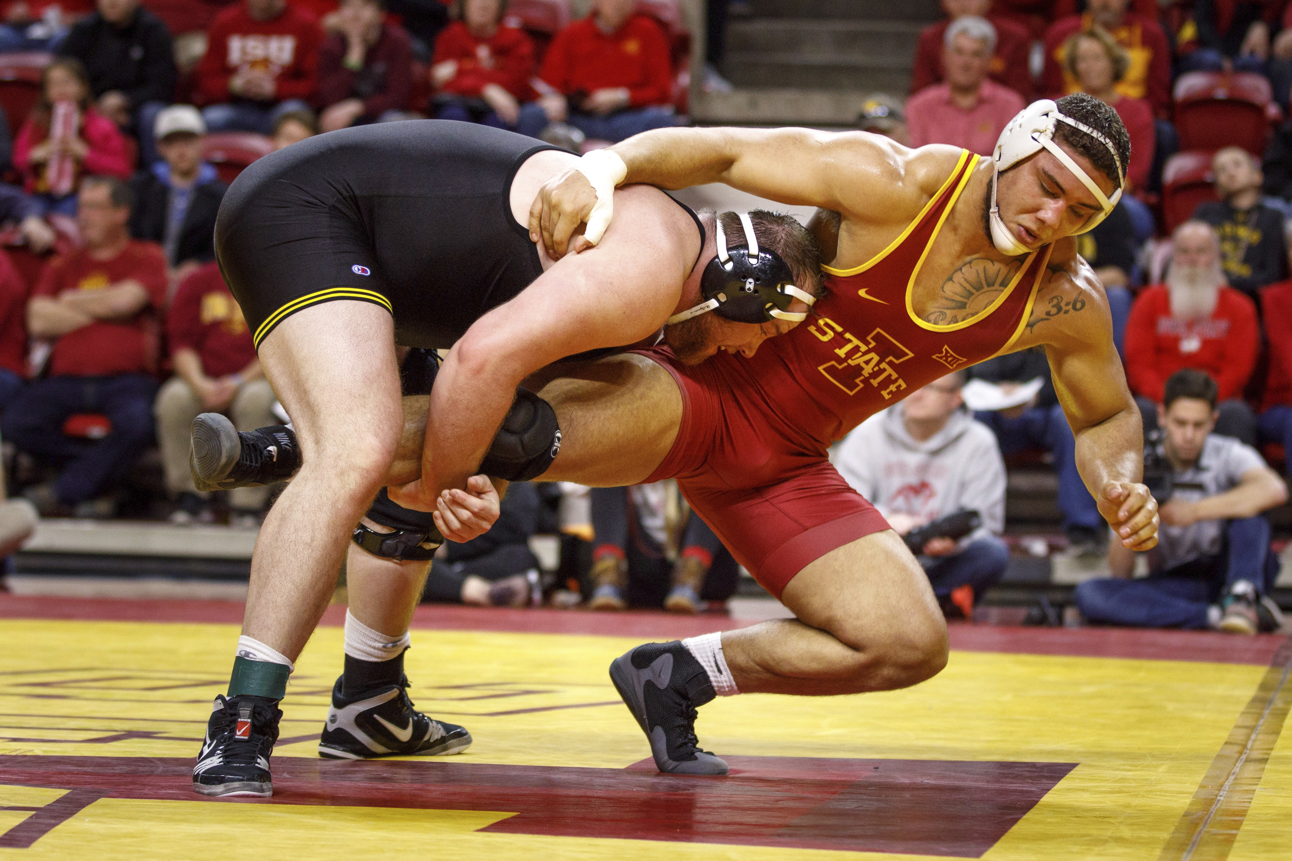 Police charge Iowa wrestler with lying about shooting