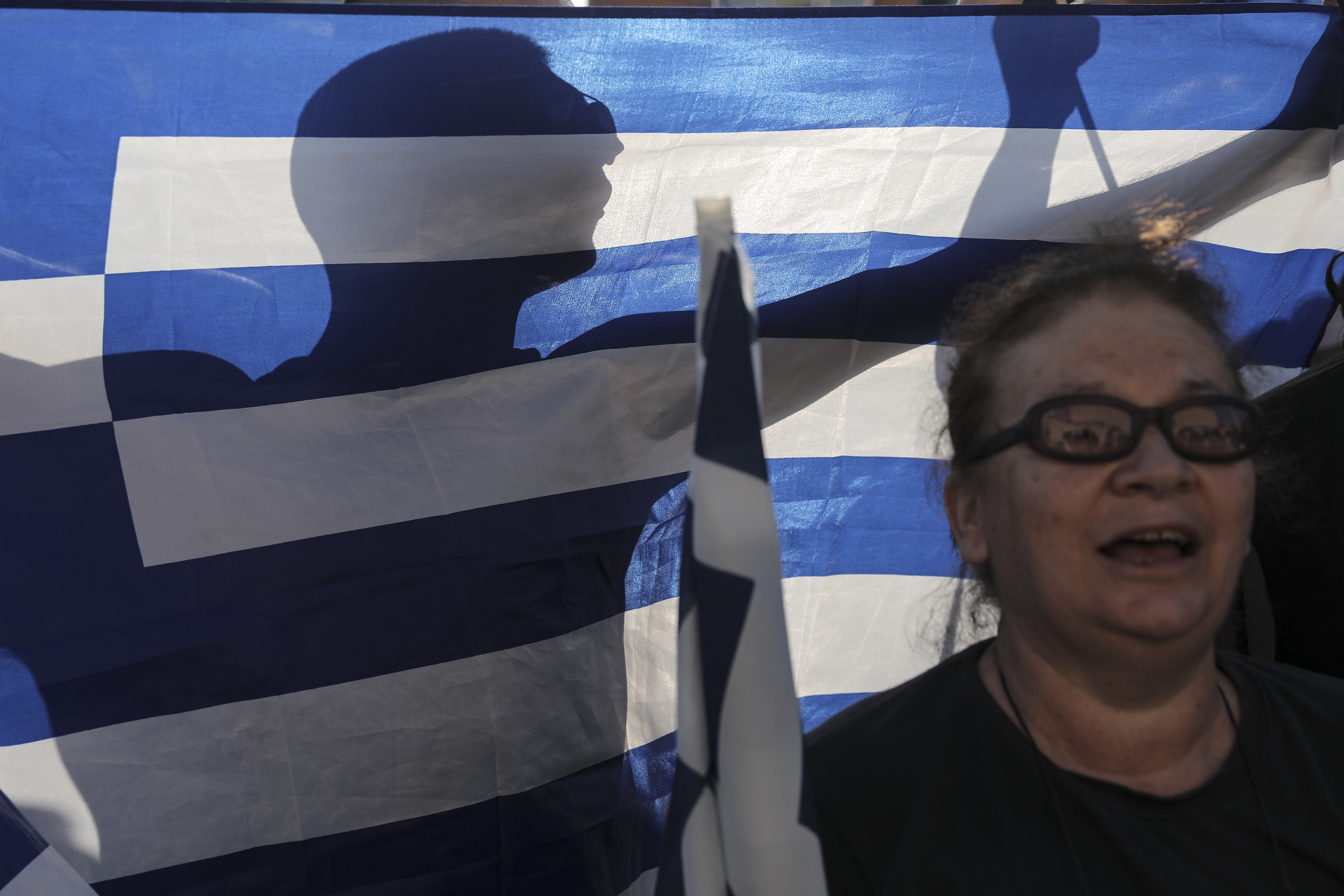 Greek central bank: crisis not over with bailout exit