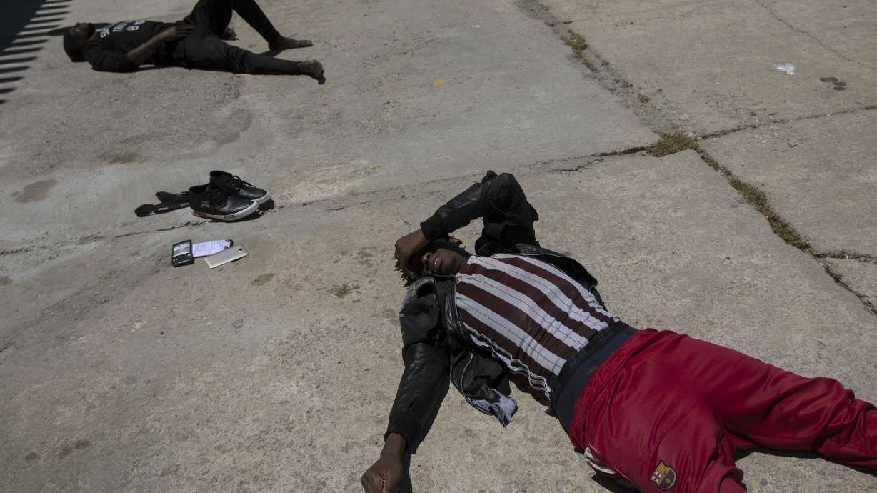 AP PHOTOS: Cellphones, teenagers on migrant route to Europe