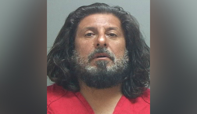 Man fired gun at ex-girlfriend's house with her inside, police say