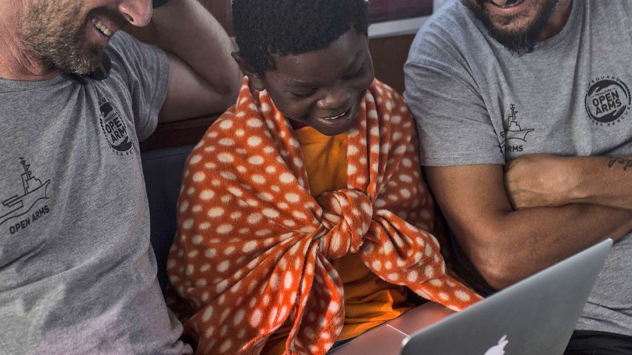 The Latest: Columbus statue protest over migrant deaths