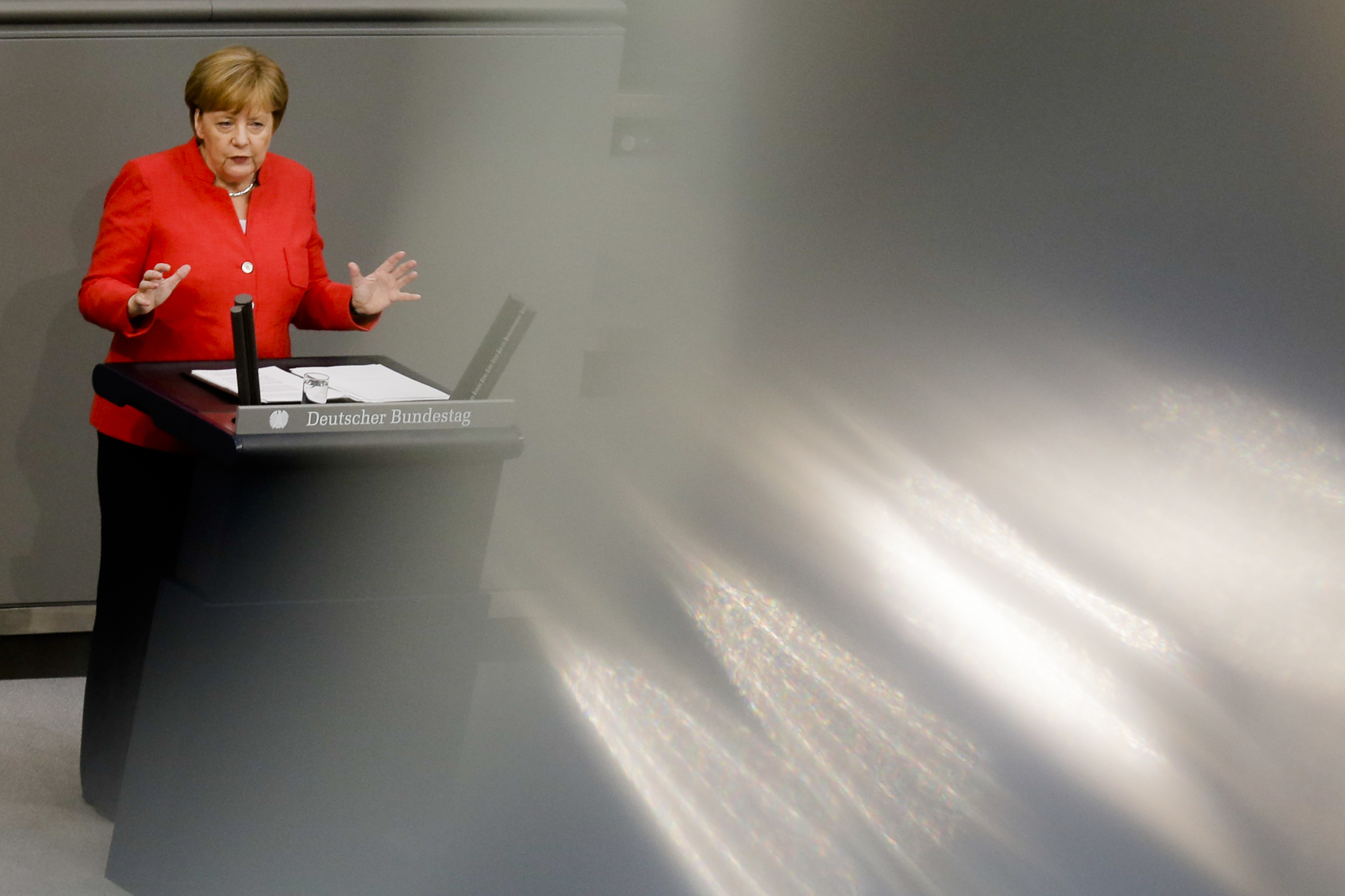 Germany's Merkel says migration deal is no about-turn