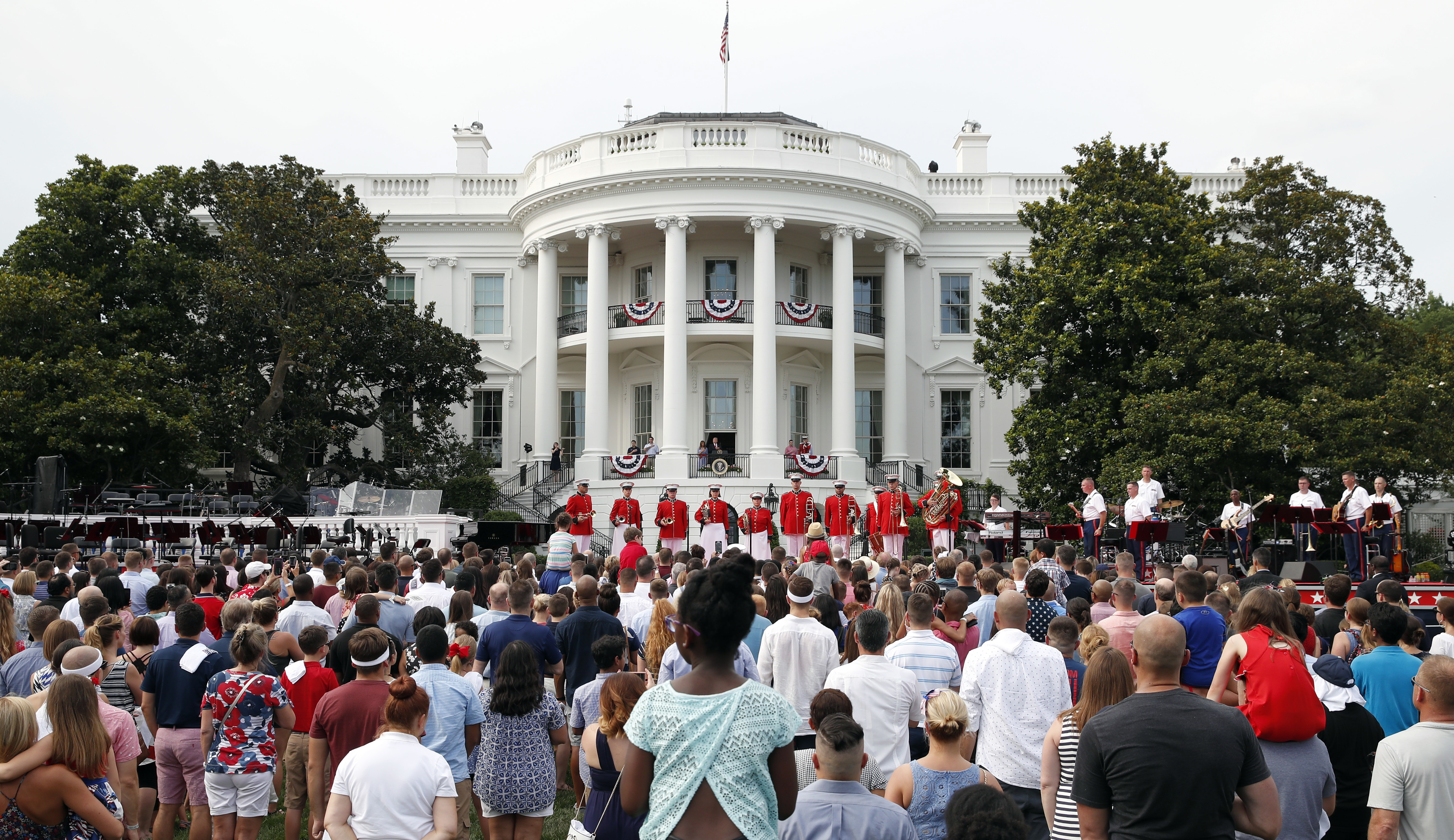 The Latest: Trump says military keeps America safe, strong