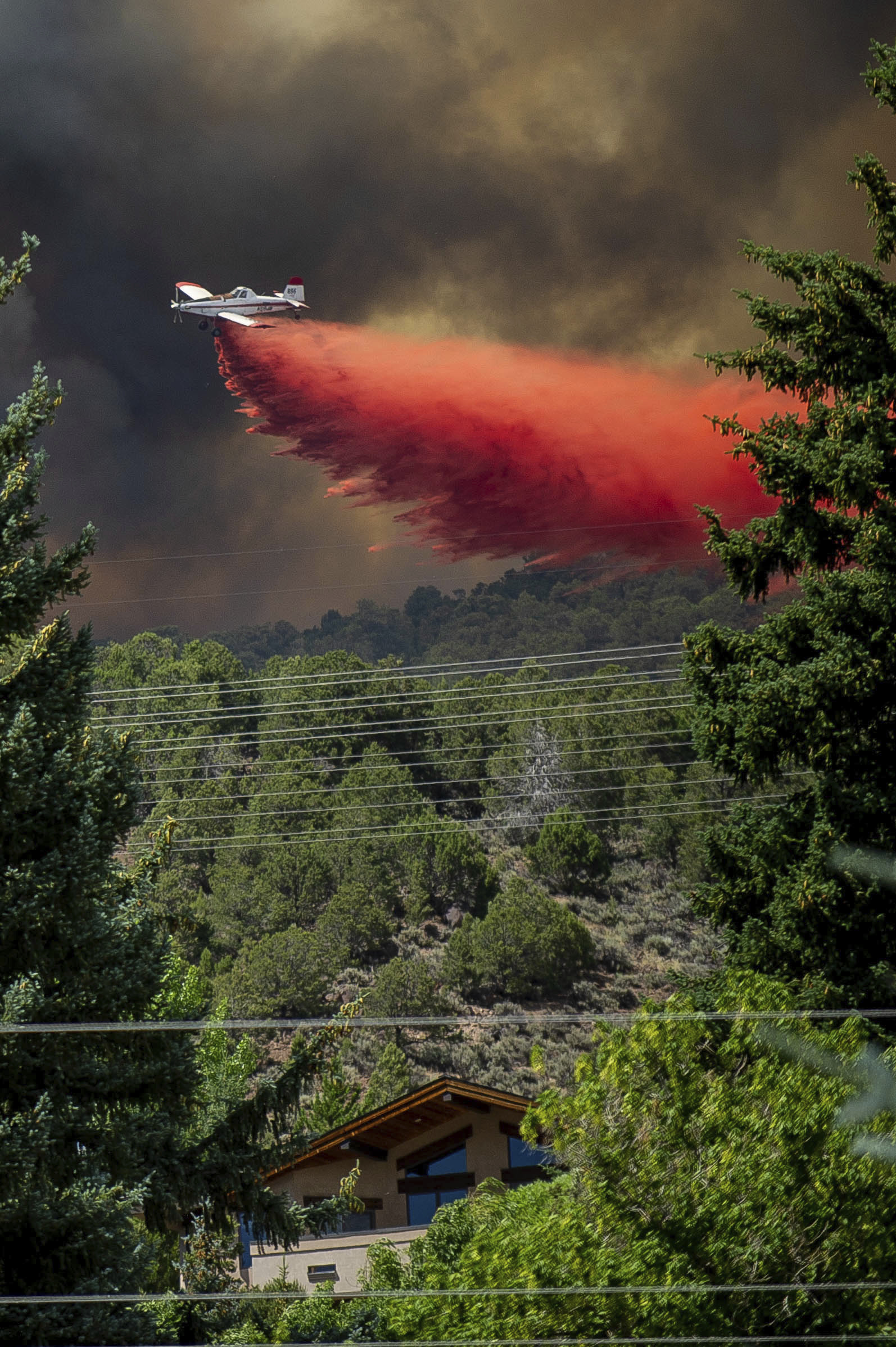 Fires menace US West, tornado touches Colorado wildfire site