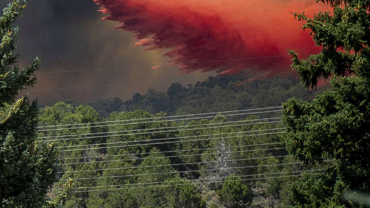 Fires menace US West, tornado touches Colorado wildfire site