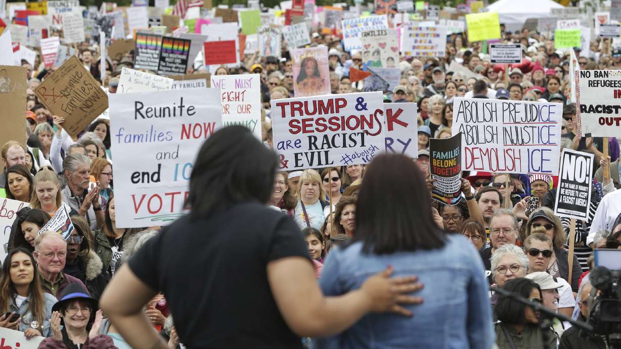 US to reunite migrant families as immigration politics boil