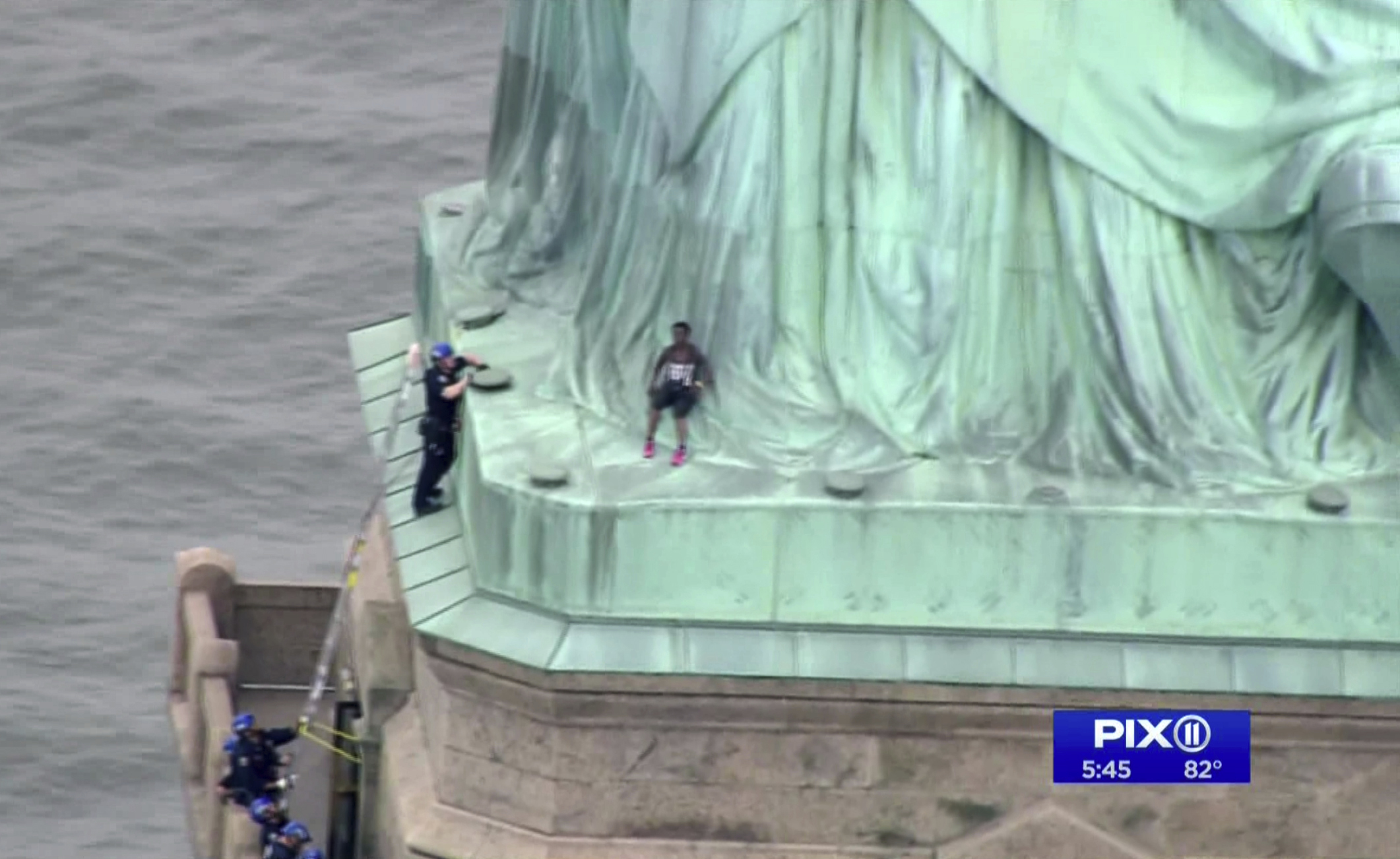 The Latest: Trump calls Statue of Liberty climber a clown