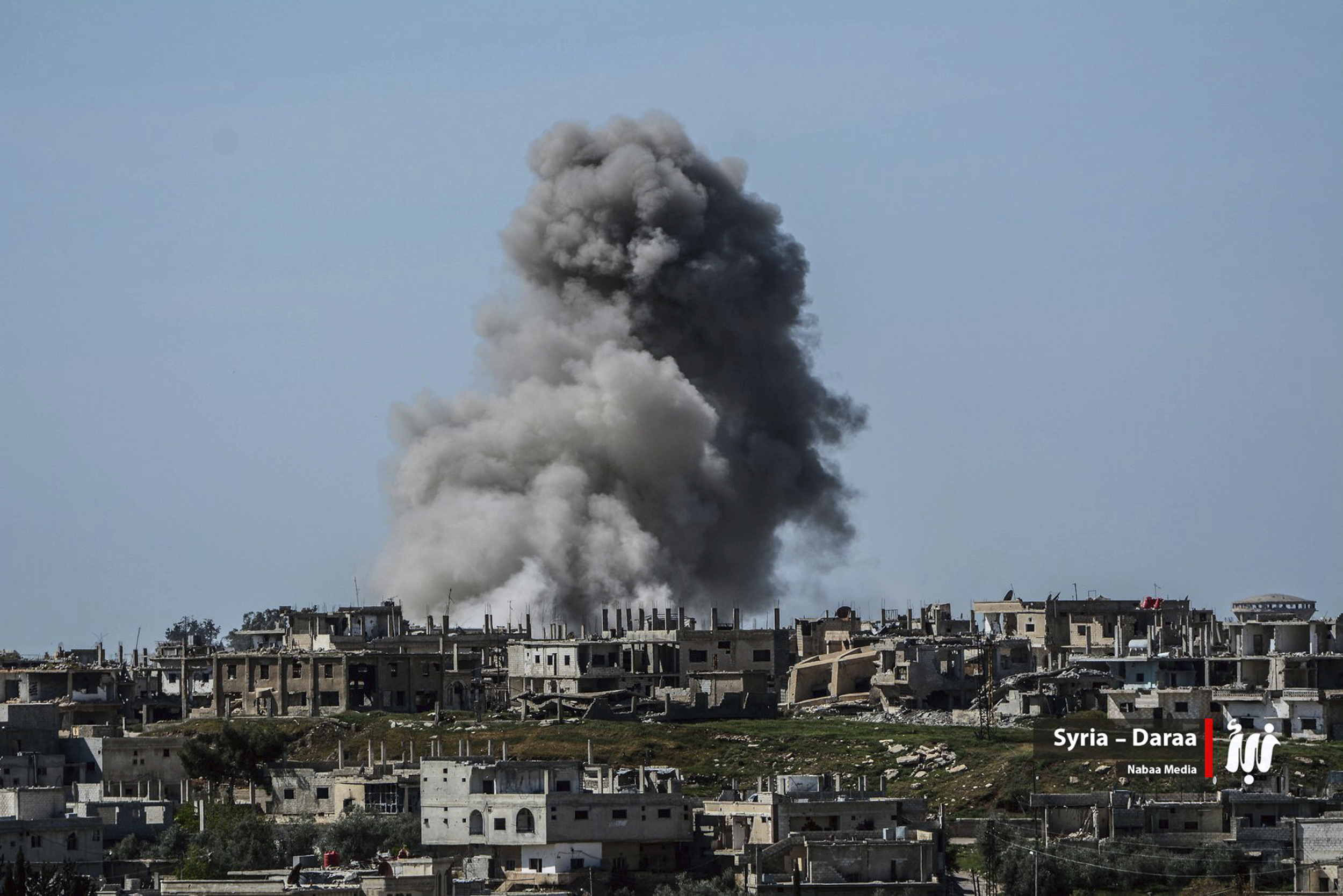 Syrian troops celebrate recapture of Jordan border crossing