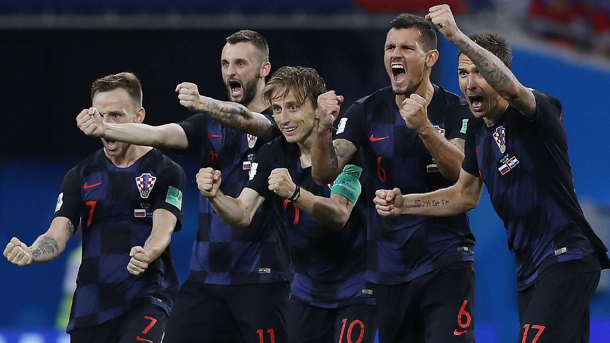 AP PHOTOS: Records, firsts, and more drama at the World Cup