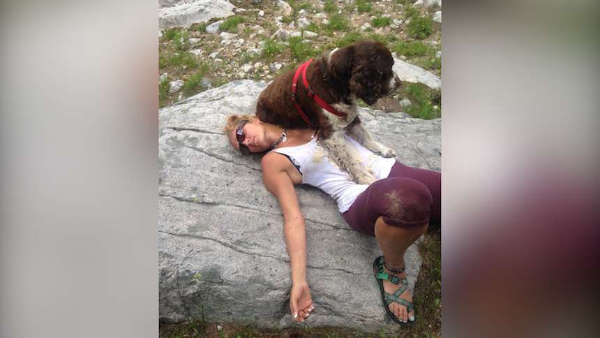 Tia Vargas made a life-changing decision while hiking in Idaho last week. She carried this dog, Boomer, who was wandering injured and without an owner on the trail, and later adopted him. (Photo courtesy of Tia Vargas)