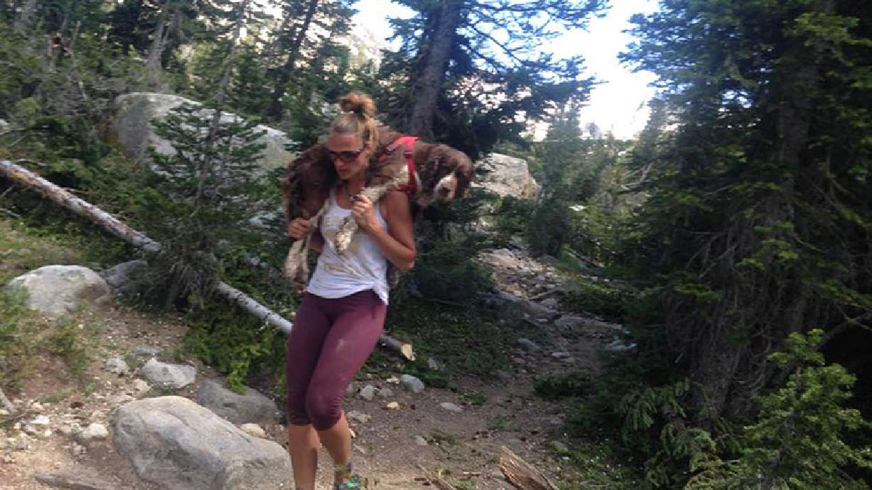 Mother credits angels for helping her carry 55 pound 'miracle' dog down steep mountain