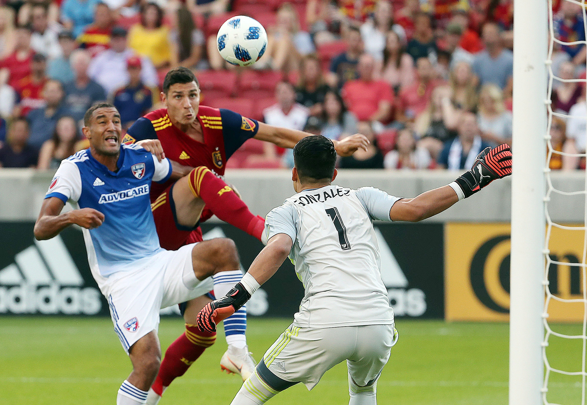 Real Salt Lake midfielder Damir Kreilach (6) and FC Dallas forward Tesho Akindele (13) battle in front of the goal during MLS soccer in Sandy on Saturday, July 7, 2018. (Photo: Ravell Call, Deseret News)