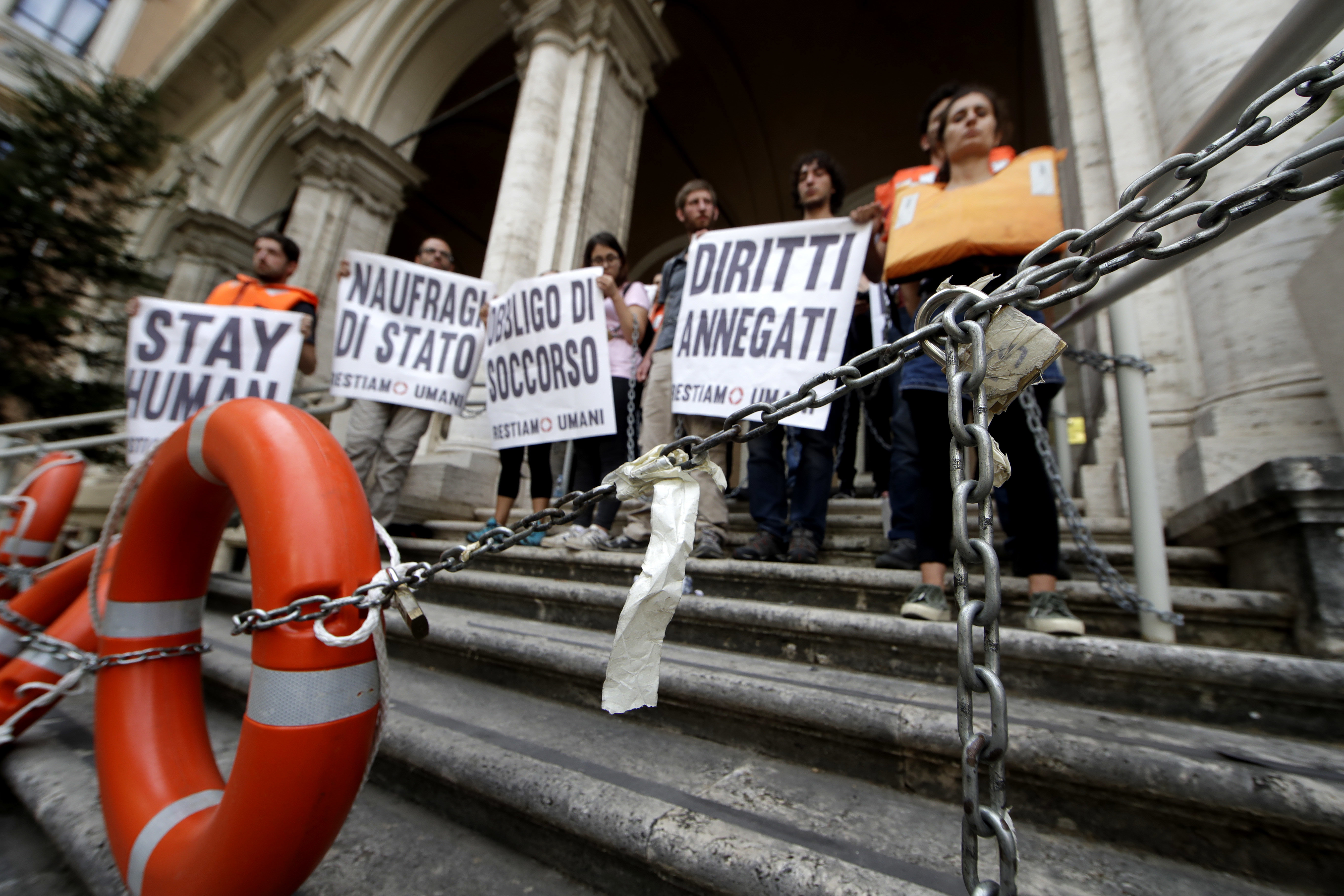 The Latest: Malta lets rescue ship captain visit elderly mom