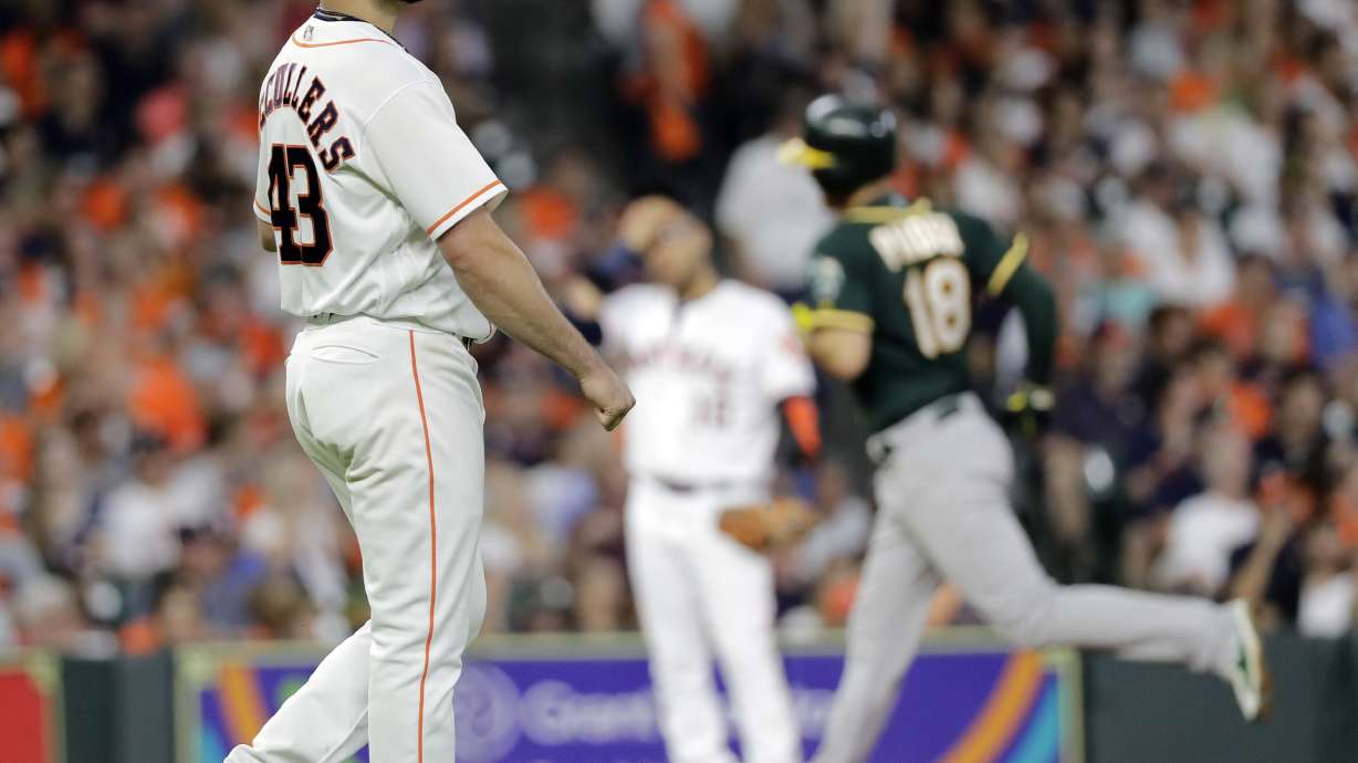 Pinder, Davis lead Athletics to 8-3 win over Astros