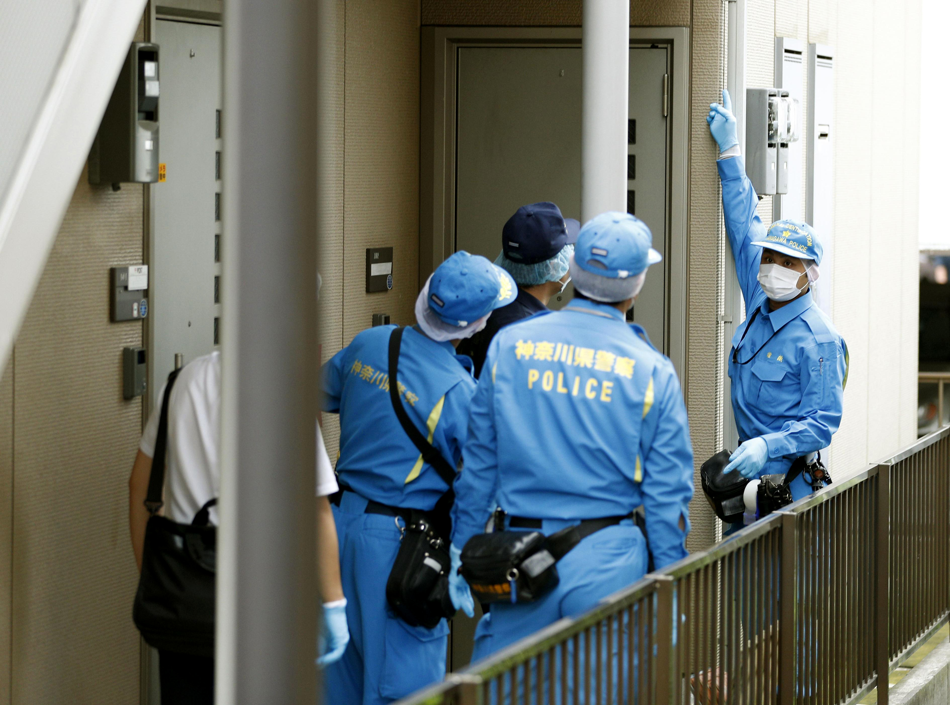 Japan police search home of nurse in hospital poison deaths