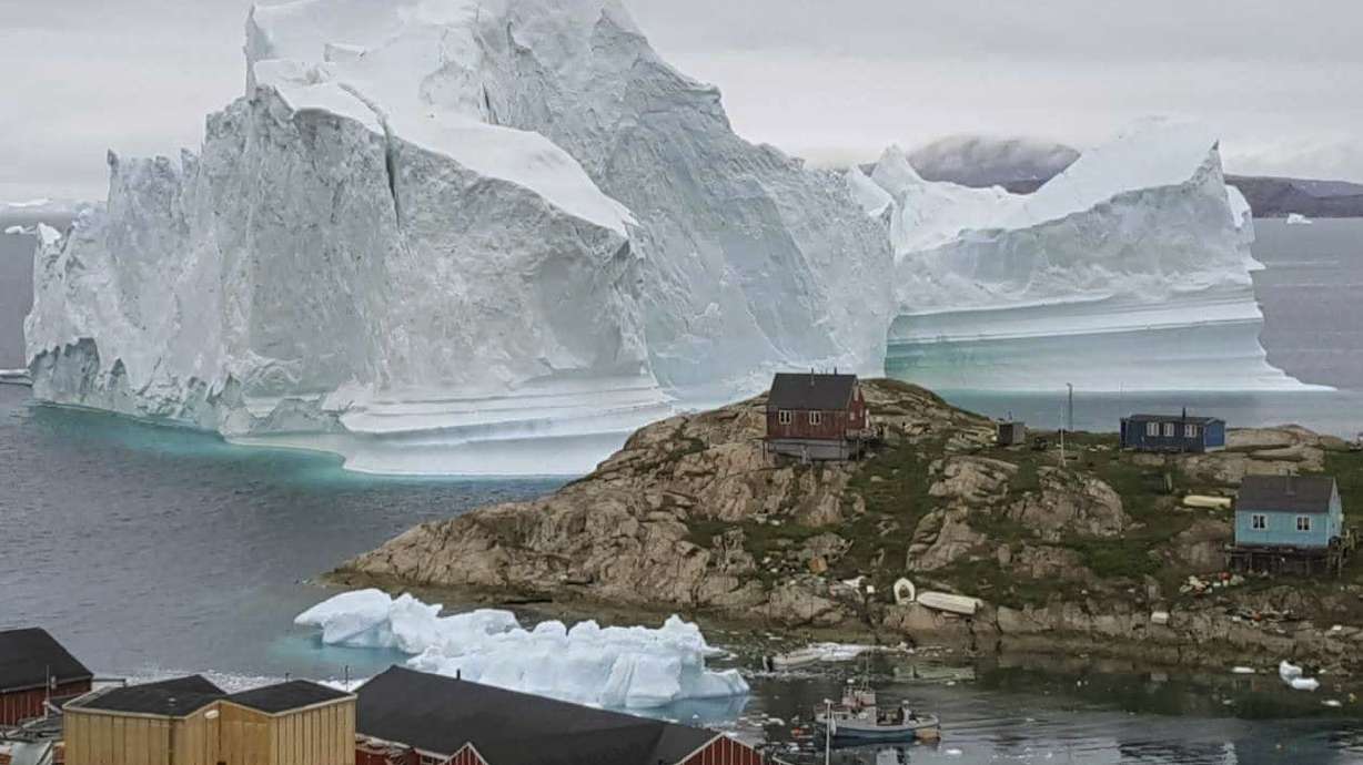 Iceberg 4 miles wide breaks off from Greenland glacier