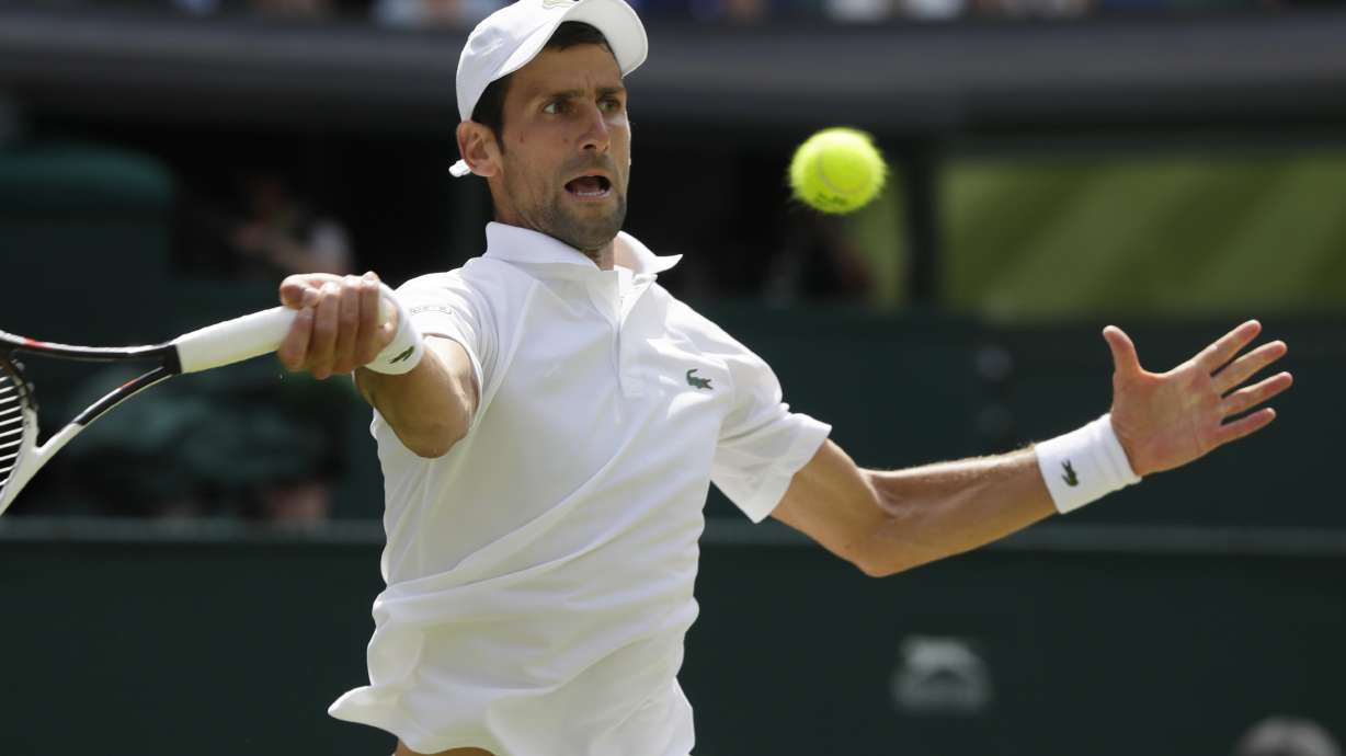 The Latest: Isner wins 3rd set of Wimbledon semi vs Anderson
