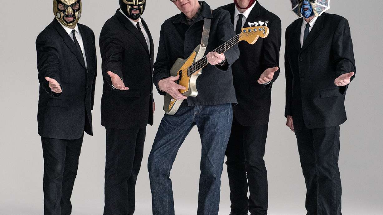 Nick Lowe rediscovers roots with Los Straitjackets