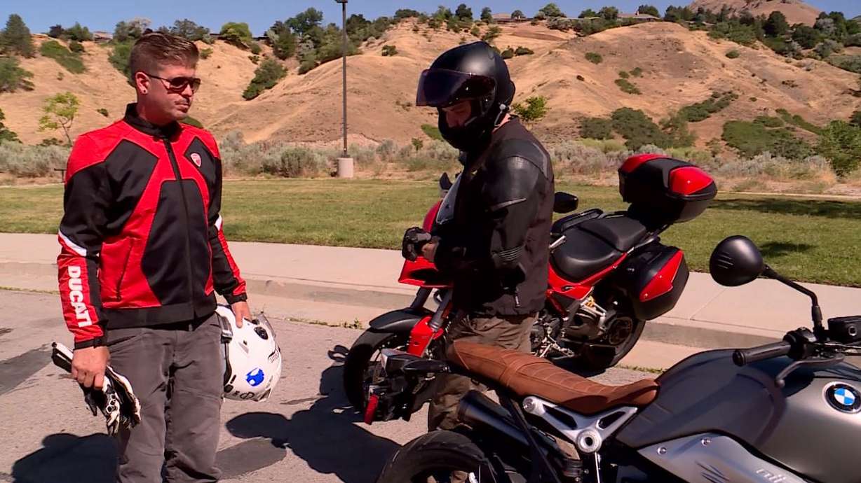 Ryan Stanley and Taylor Brody conduct a safety check on their bikes before they go for a ride. (Photo: KSL TV)