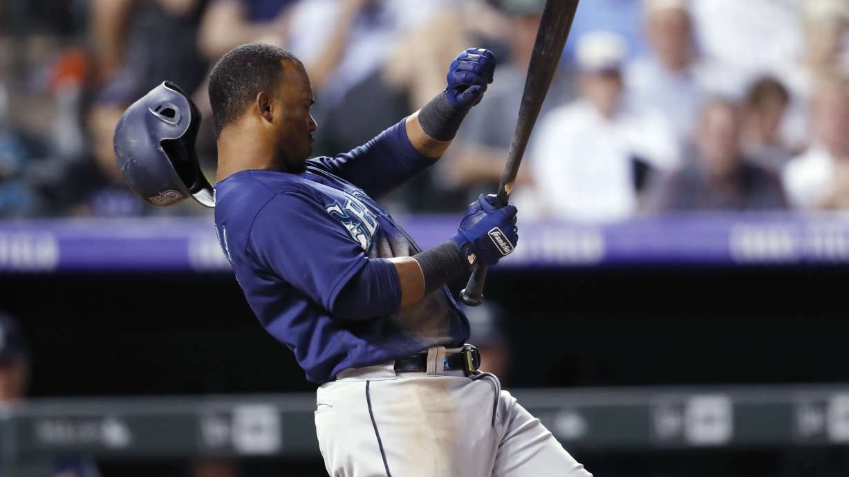 Story homers, drives in 4 as Rockies beat Mariners 10-7