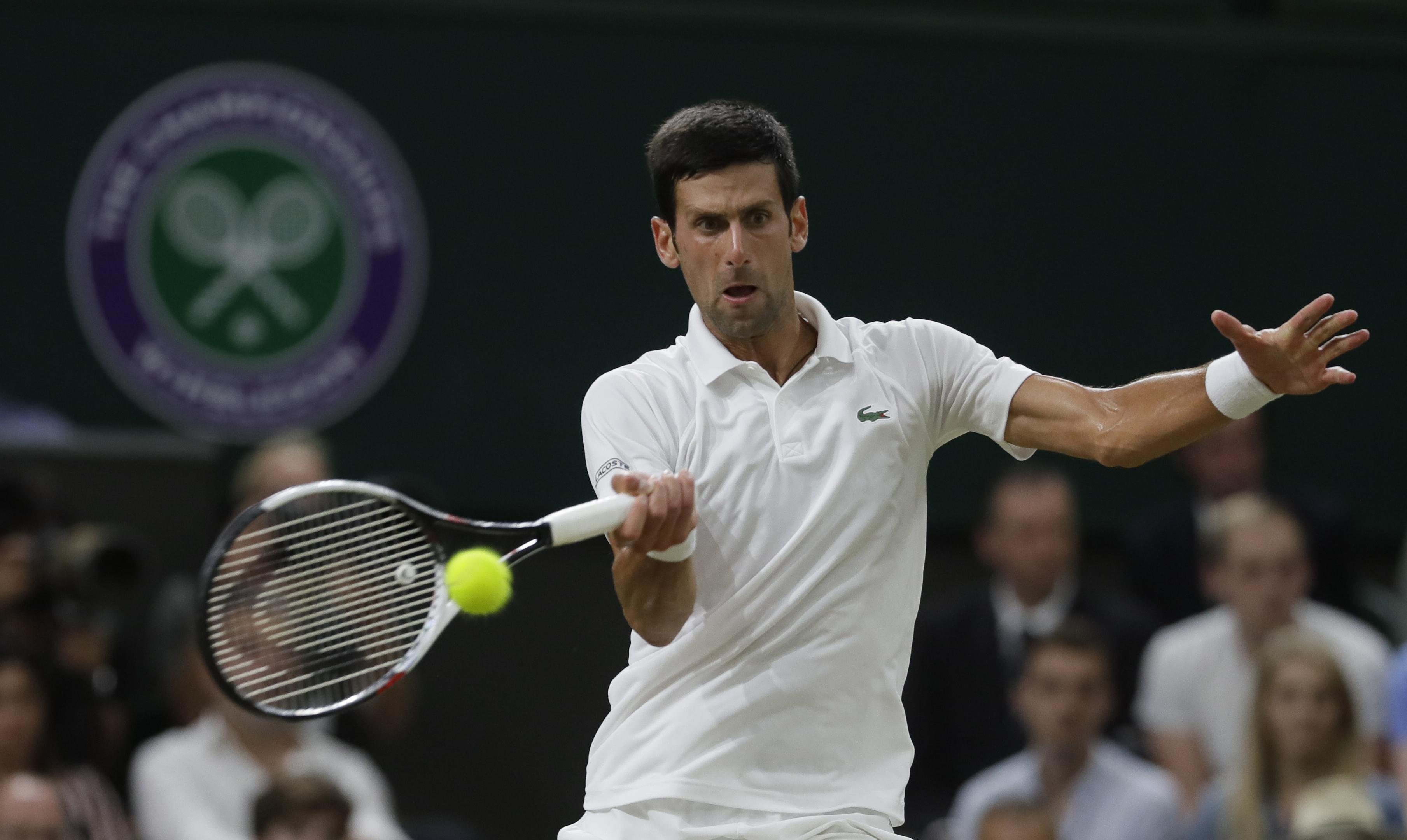 The Latest: Swiatek wins Wimbledon girls' title