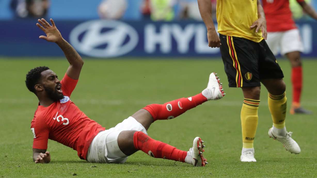 The Latest: Martinez praises Belgians for style, substance