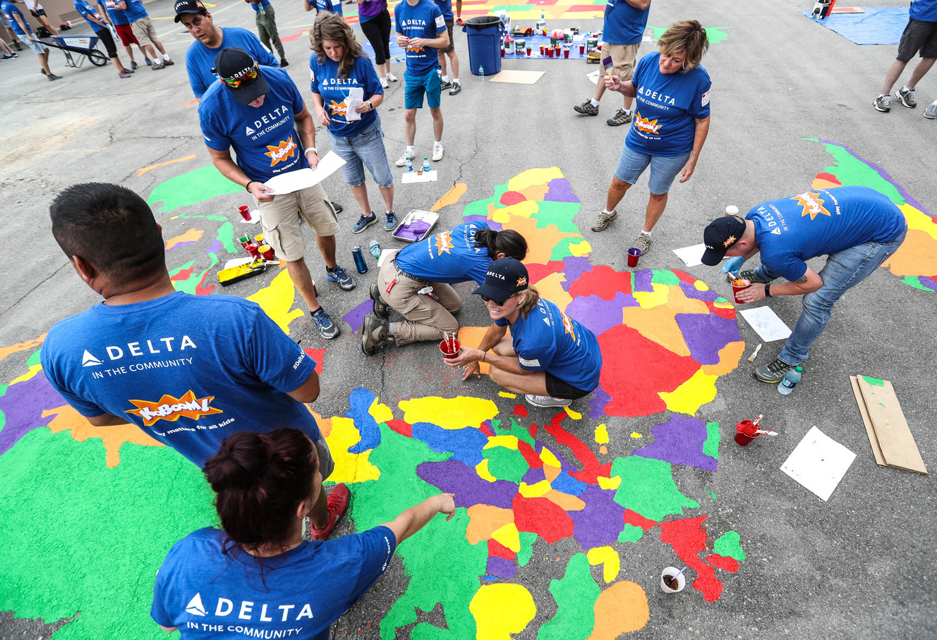 Volunteers from Delta Air Lines, Utah Community Action and the community join KaBOOM! in transforming an empty site into a kid-designed, state-of-the-art playground at James R. Russell Head Start in Salt Lake City on Saturday, July 14, 2018. (Photo: Steve Griffin, KSL)