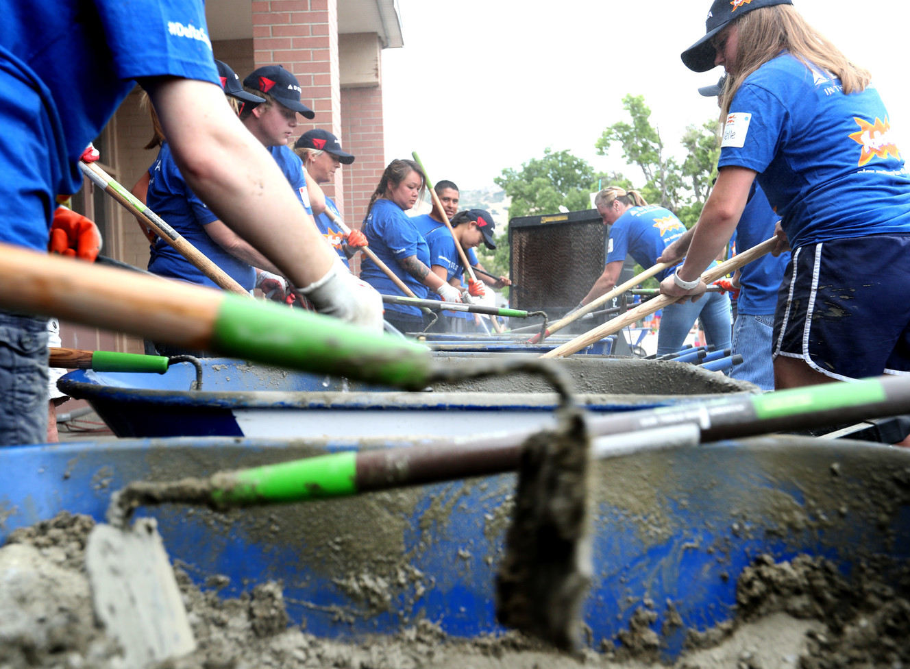 Volunteers from Delta Air Lines, Utah Community Action and the community join KaBOOM! in transforming an empty site into a kid-designed, state-of-the-art playground at James R. Russell Head Start in Salt Lake City on Saturday, July 14, 2018. (Photo: Steve Griffin, KSL)