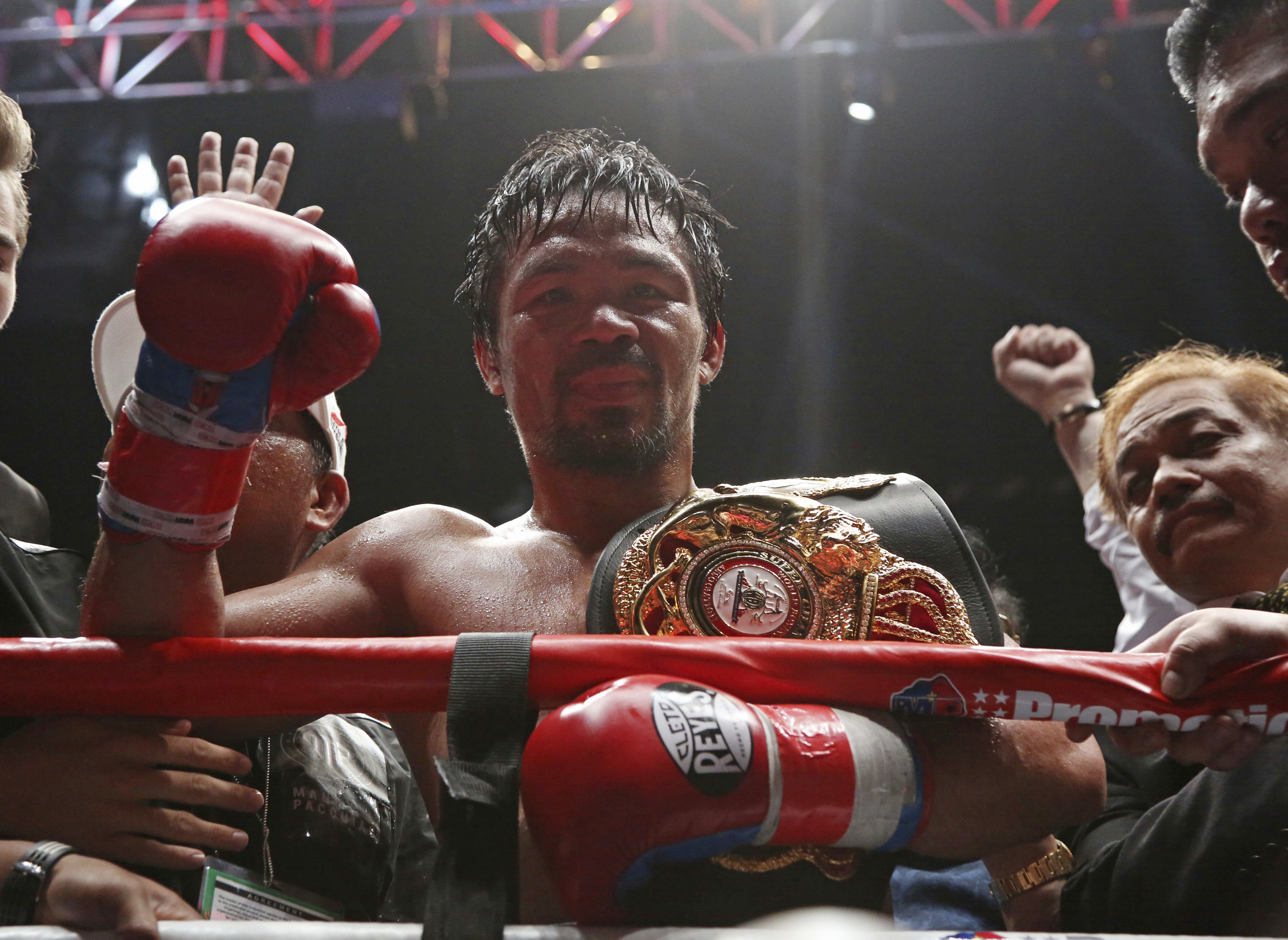 Pacquiao wins 60th career fight with seventh-round knockout