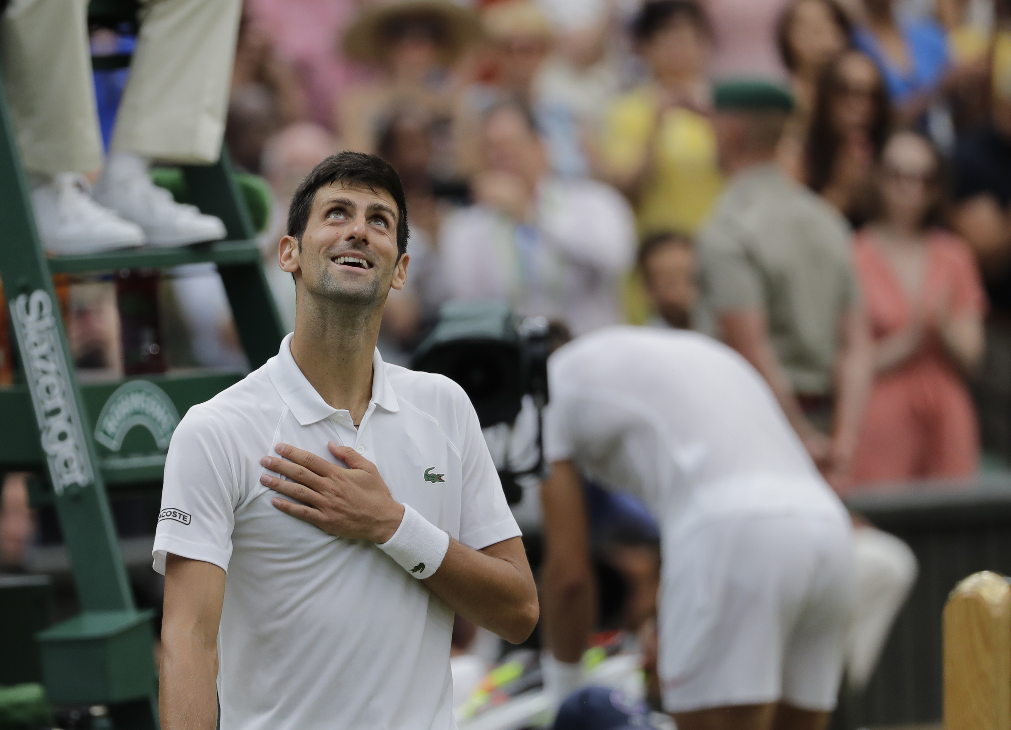 The Latest: Melichar, Peya win Wimbledon mixed doubles title