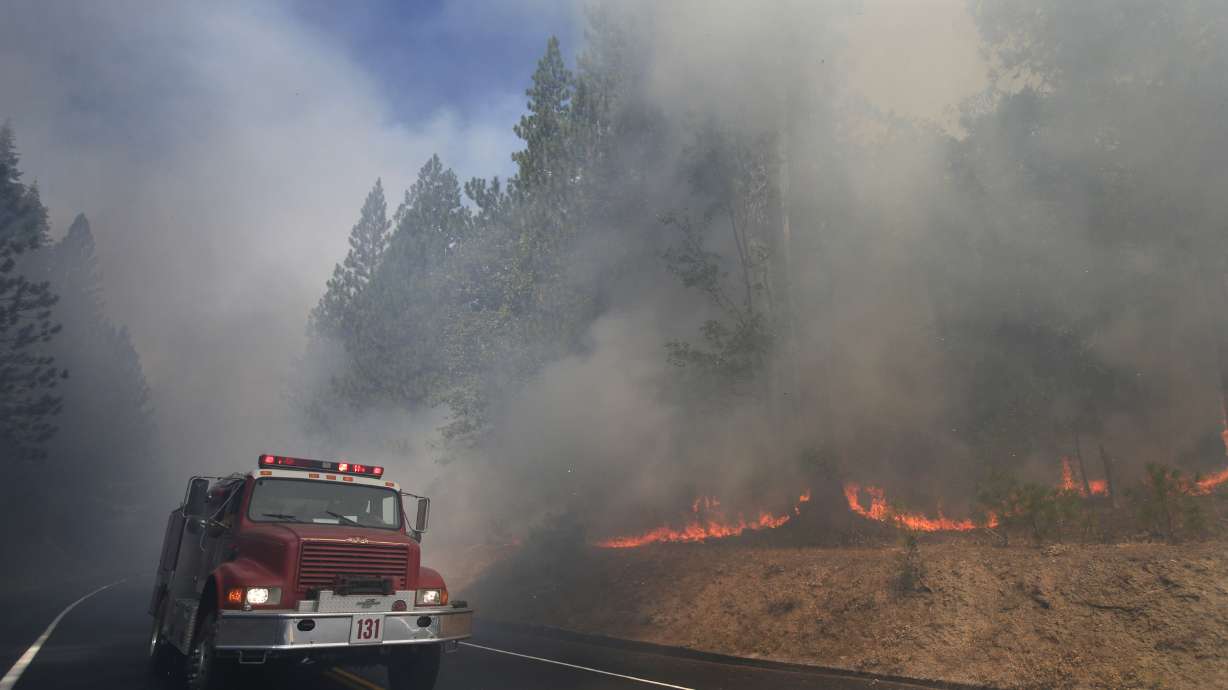 The Latest: Crews to try again to get body of firefighter