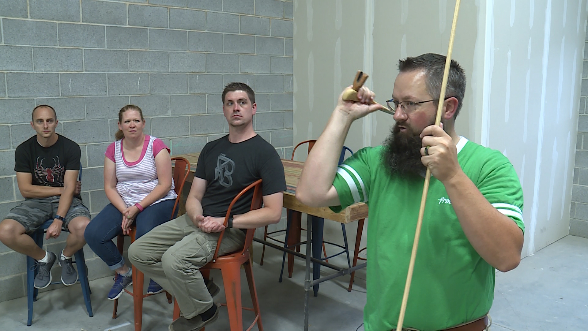 Taylor Reynolds, far right, shows the proper way to use an atlatl on Tuesday, July 3rd, 2018. (Photo: Ray Boone, KSL TV)