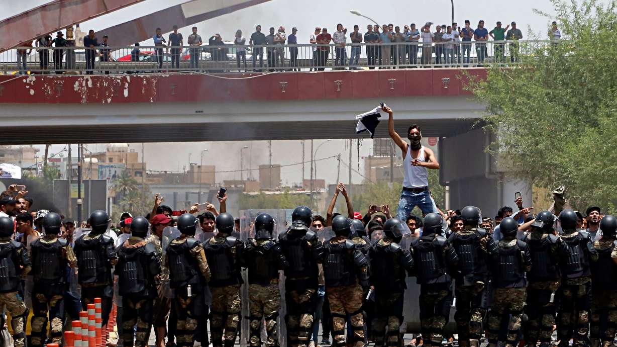 Activists: Iraqi police arresting protesters in the south