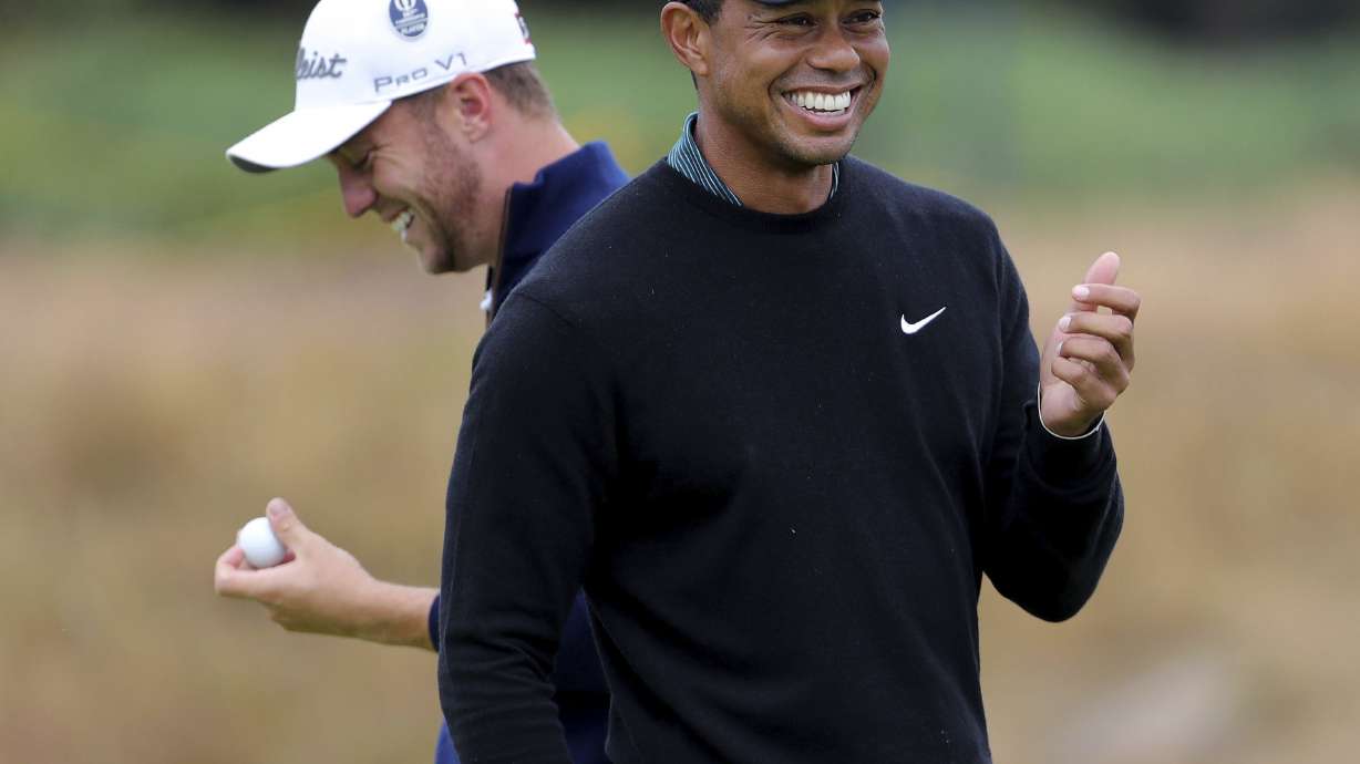 The Latest: Johnson wins a trophy without hitting a shot