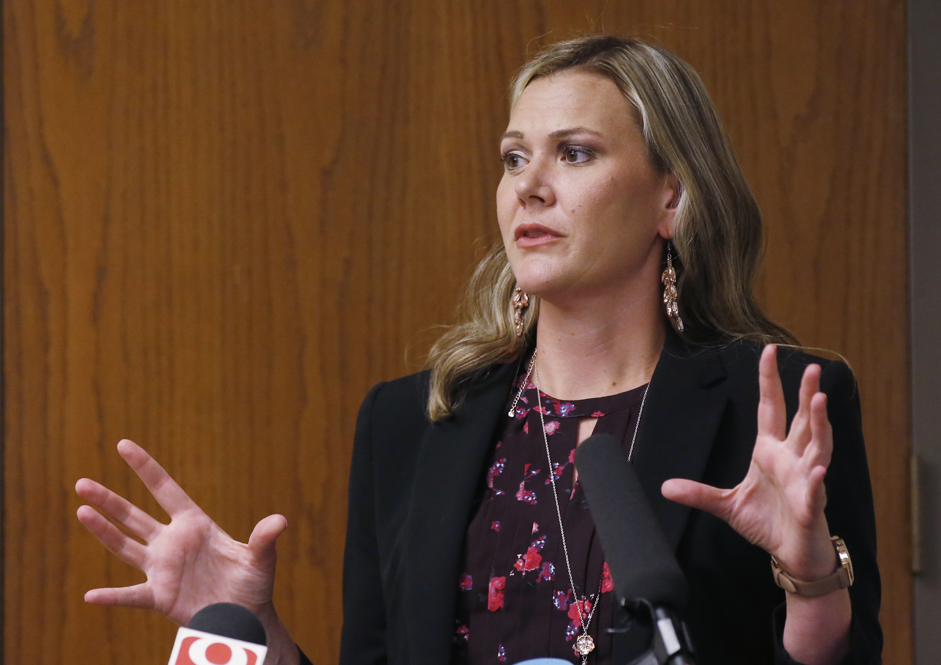 The Latest: Health agency's ex-lawyer charged over threats