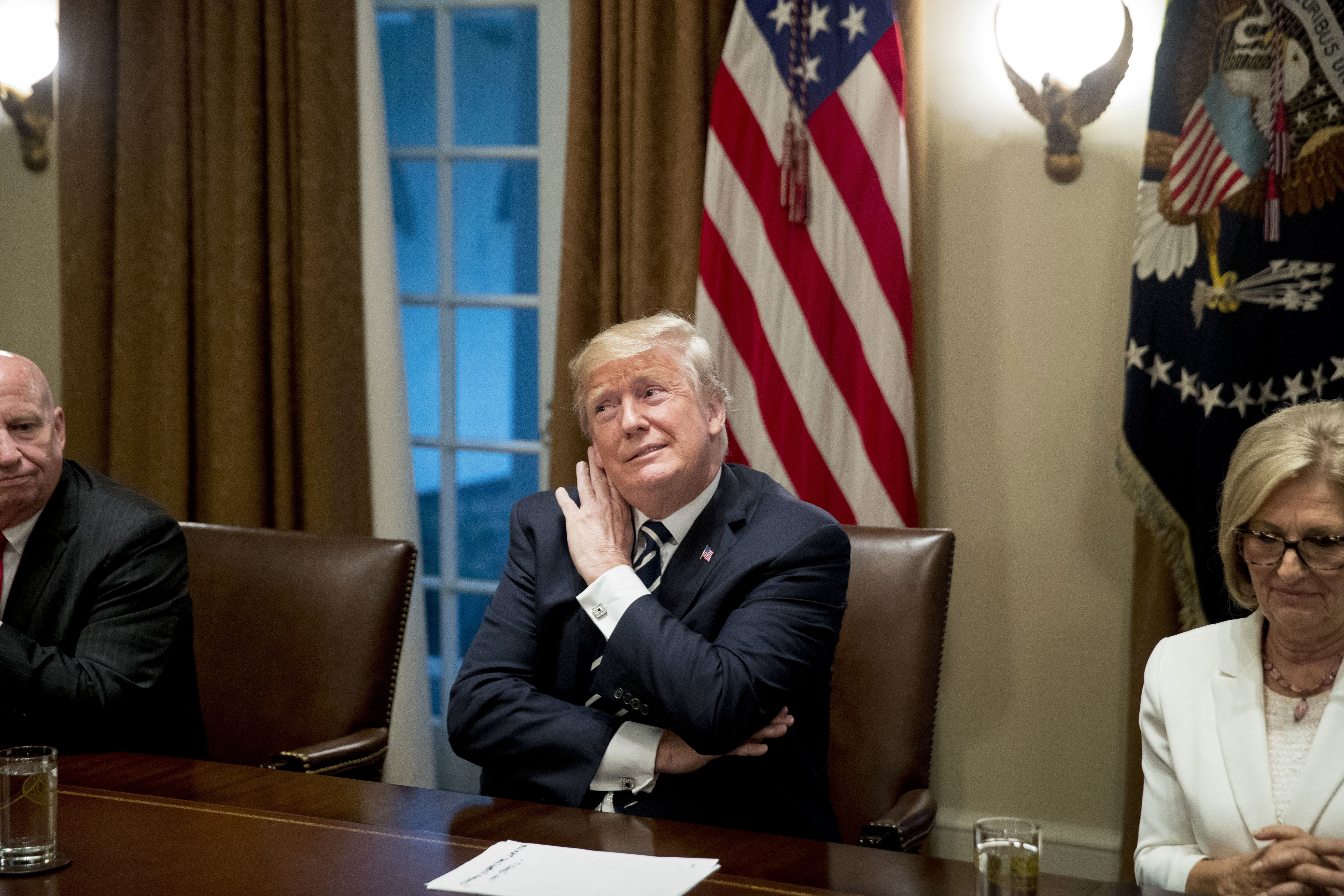 Trump blames 'double negative' for furor over Putin meeting