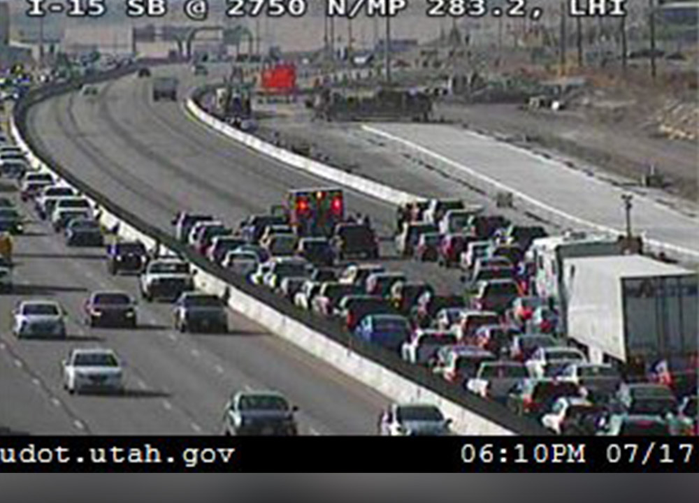 Motorcyclist injured after mattress flies out of SUV