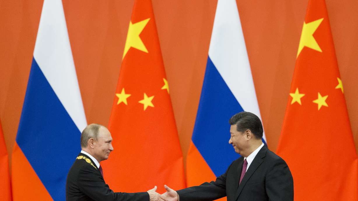 In battle for Putin's affections, cupid favors Xi over Trump