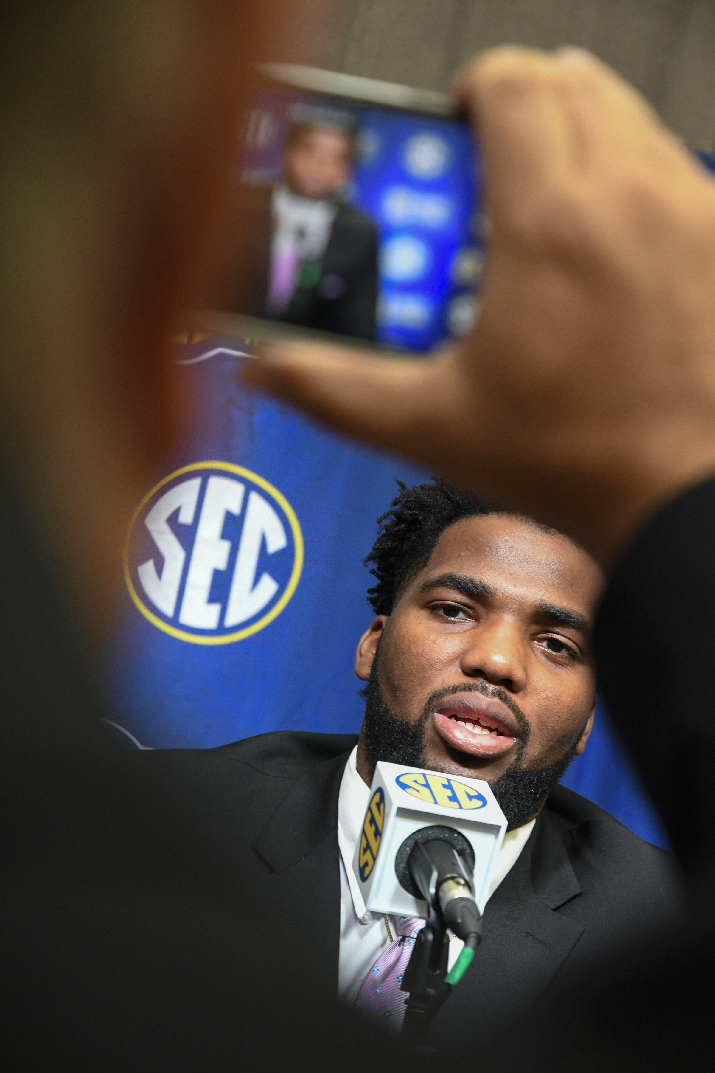 The Latest: Odom beaten to fashion punch at SEC Media Days